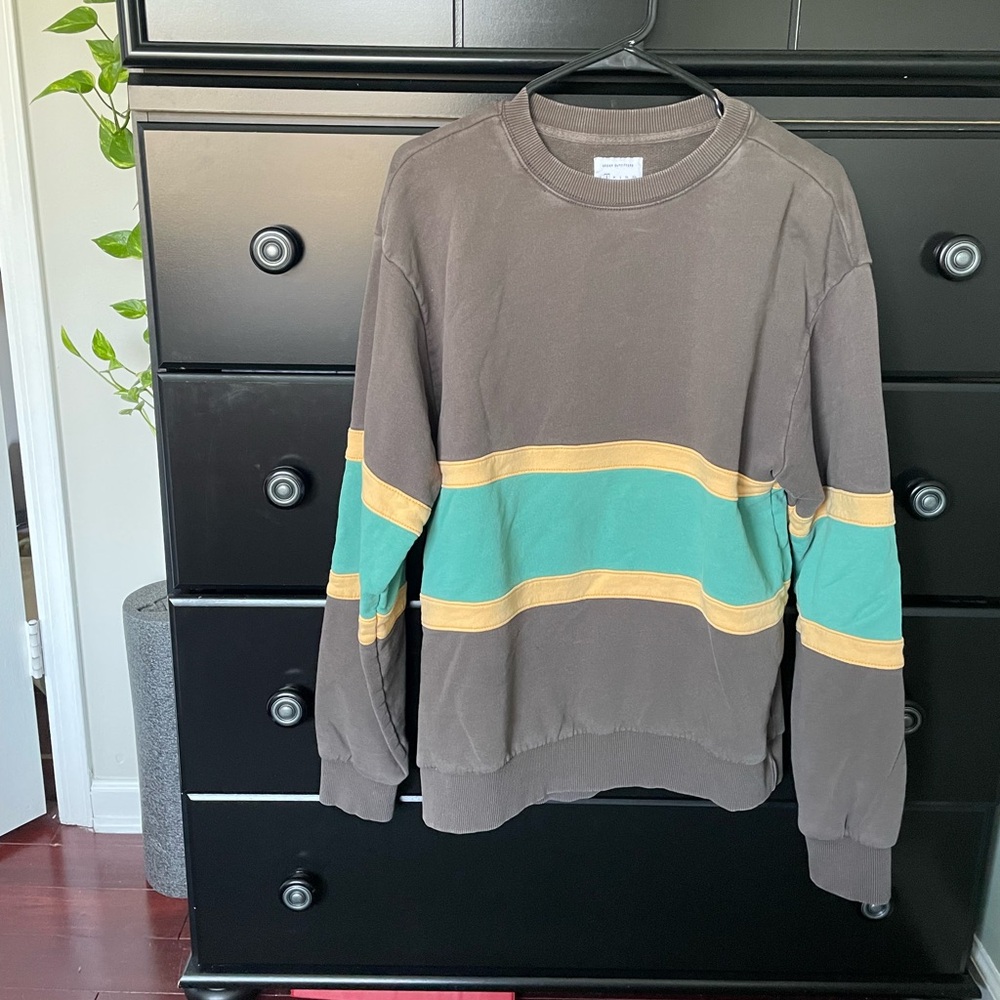 Urban outfitters distressed sweat shirt size small.